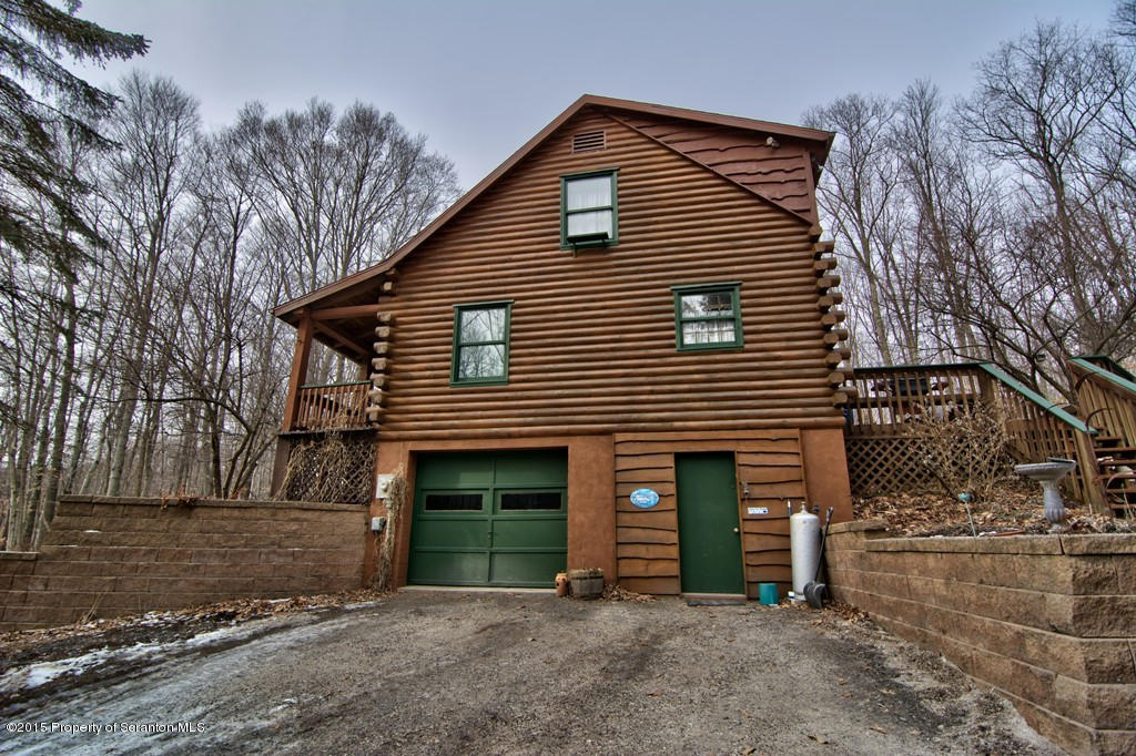 28 Elias Road Moscow, PA 18444 - Photo 2 of 69 a front view of a house with a yard