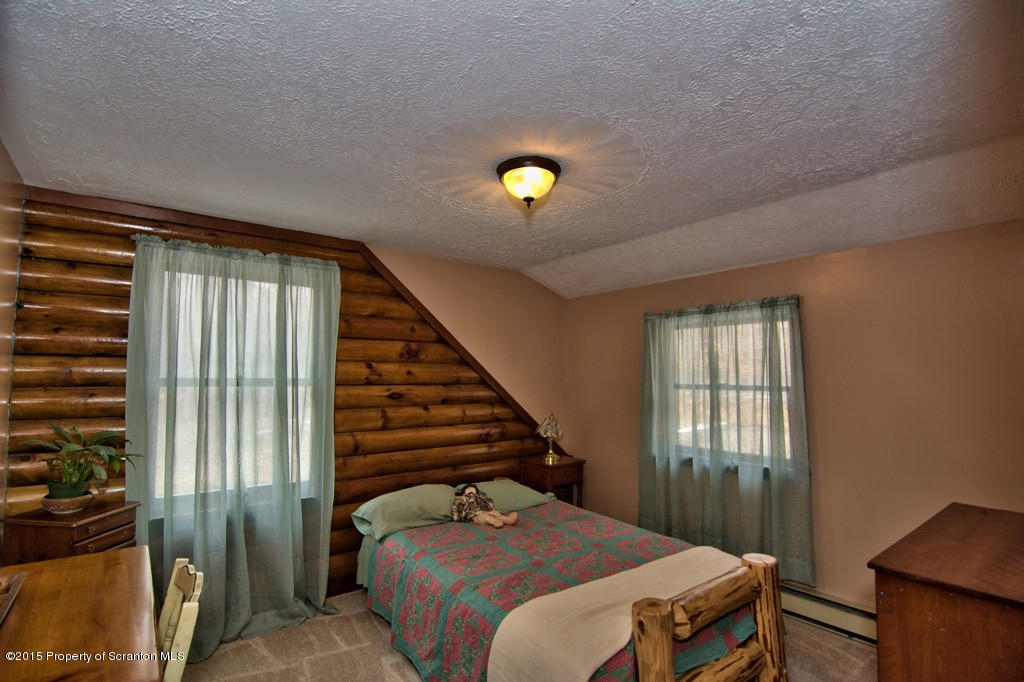28 Elias Road Moscow, PA 18444 - Photo 26 of 69 a bedroom with a bed and a window