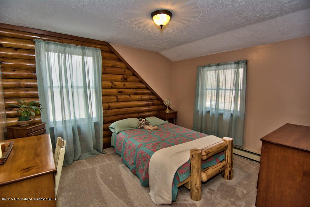 28 Elias Road Moscow, PA 18444 - Photo 27 of 69 a bedroom with a bed and a window