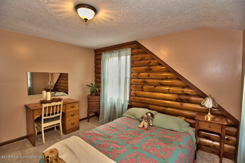 28 Elias Road Moscow, PA 18444 - Photo 28 of 69 a bedroom with a bed and a desk