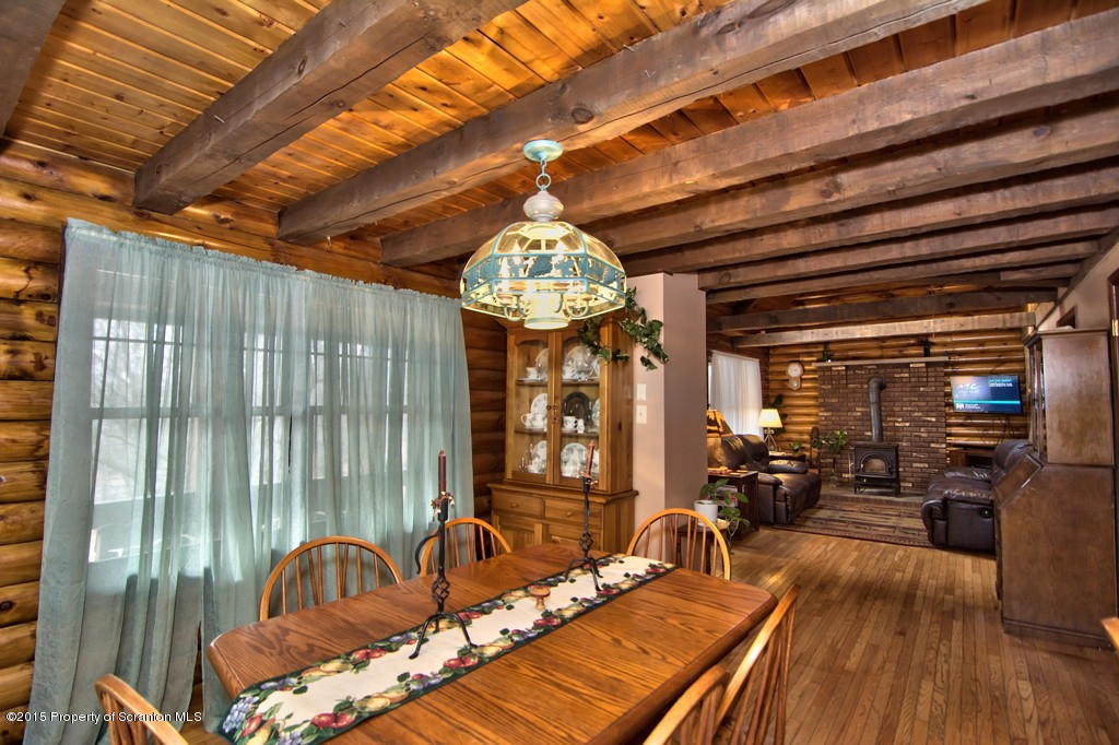 28 Elias Road Moscow, PA 18444 - Photo 33 of 69 a view of a room with furniture wooden floor and chandelier