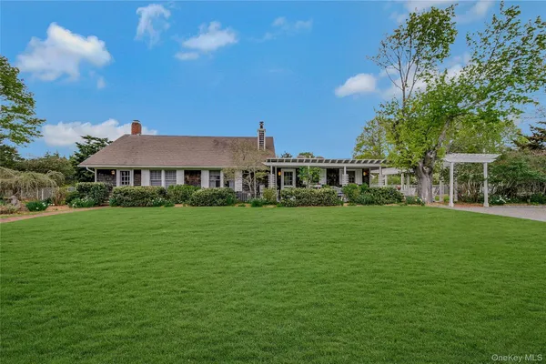 a view of a house with a big yard