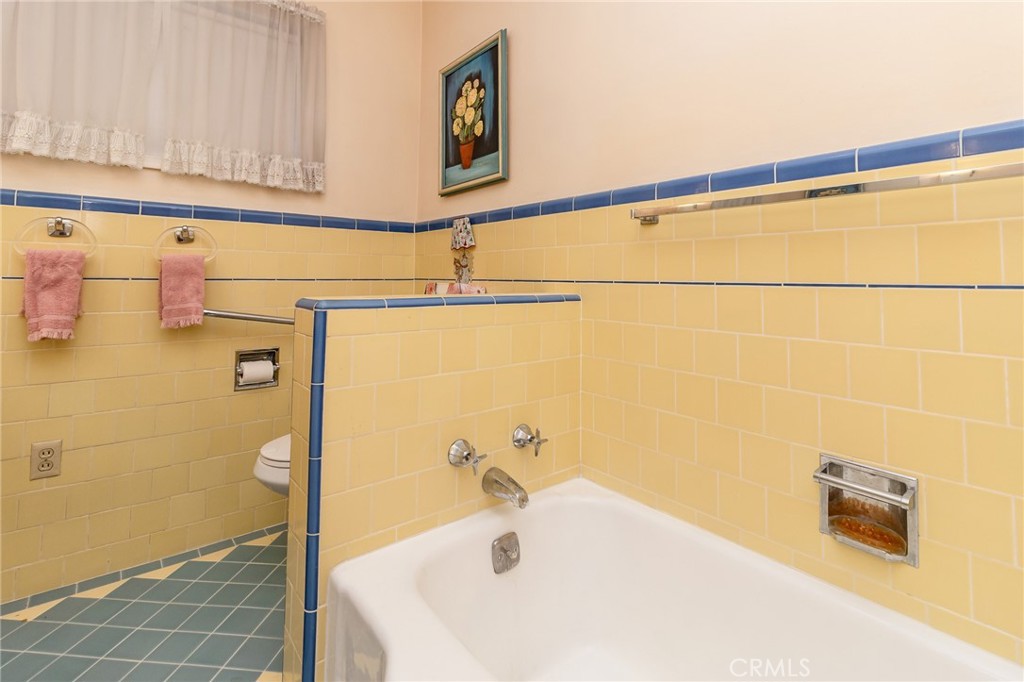 630 Acoma Street Needles, CA 92363 - Photo 19 of 60 a bathroom with a sink and a shower