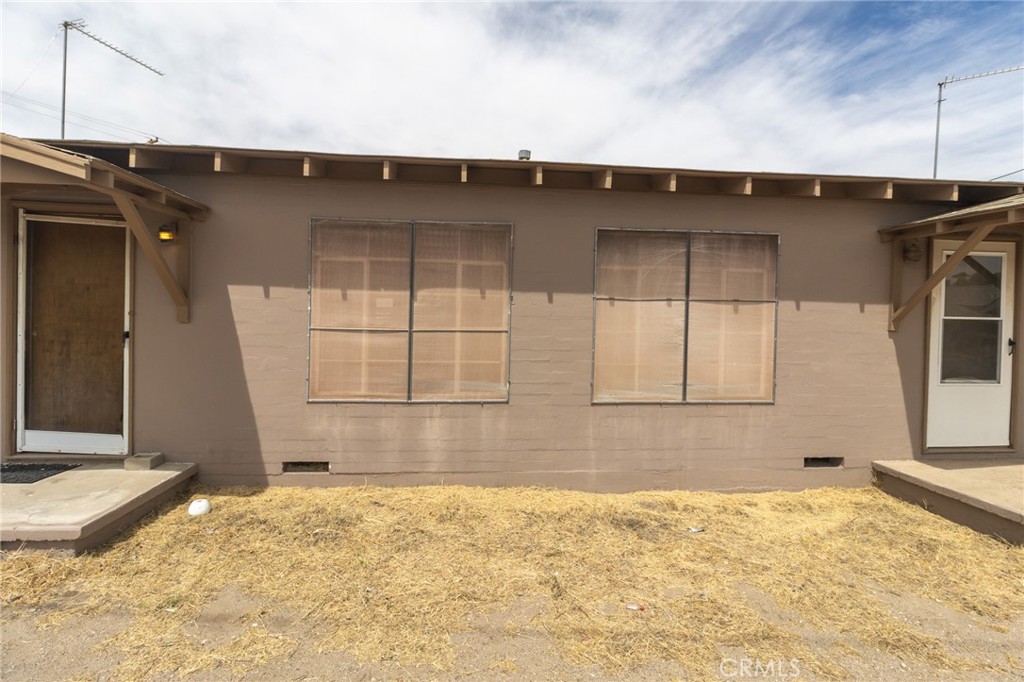 630 Acoma Street Needles, CA 92363 - Photo 32 of 60 a view of a backyard of a house
