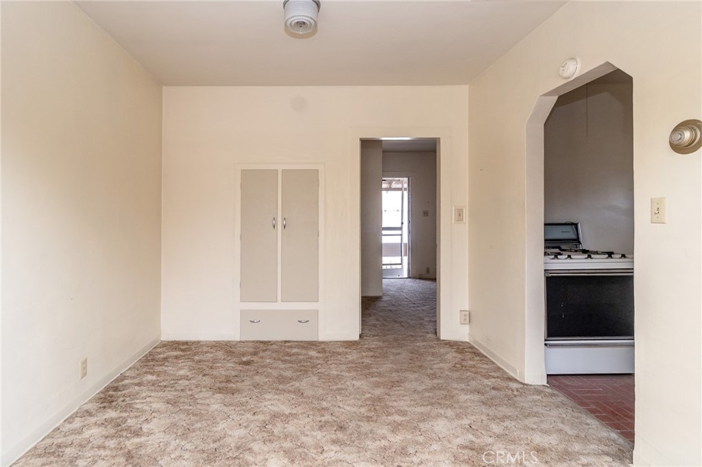 630 Acoma Street Needles, CA 92363 - Photo 48 of 60 a view of a hallway with wooden floor and closet
