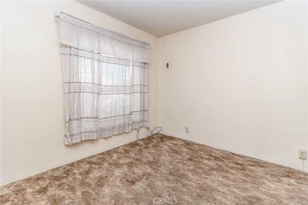 630 Acoma Street Needles, CA 92363 - Photo 52 of 60 an empty room with cabinet