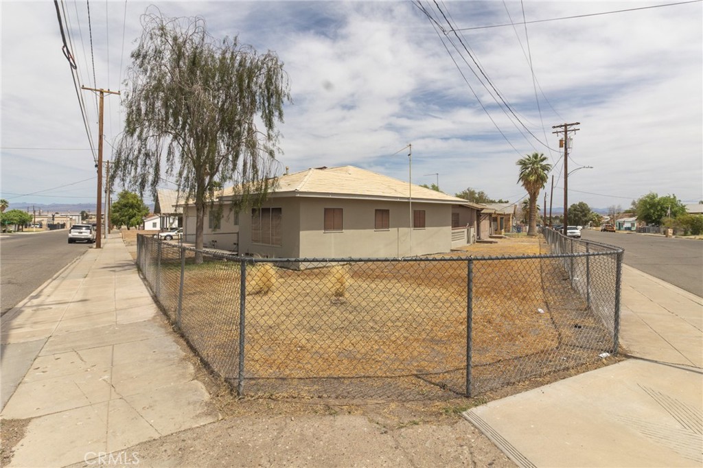 630 Acoma Street Needles, CA 92363 - Photo 60 of 60 a view of a swimming pool with a patio