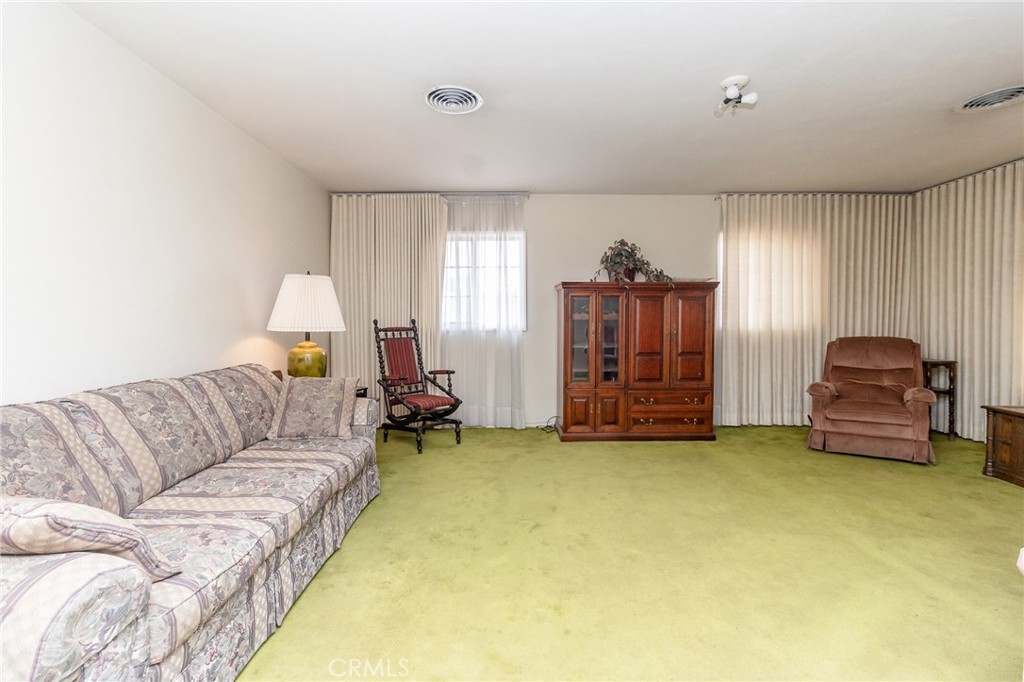 630 Acoma Street Needles, CA 92363 - Photo 8 of 60 a living room with furniture and a couch