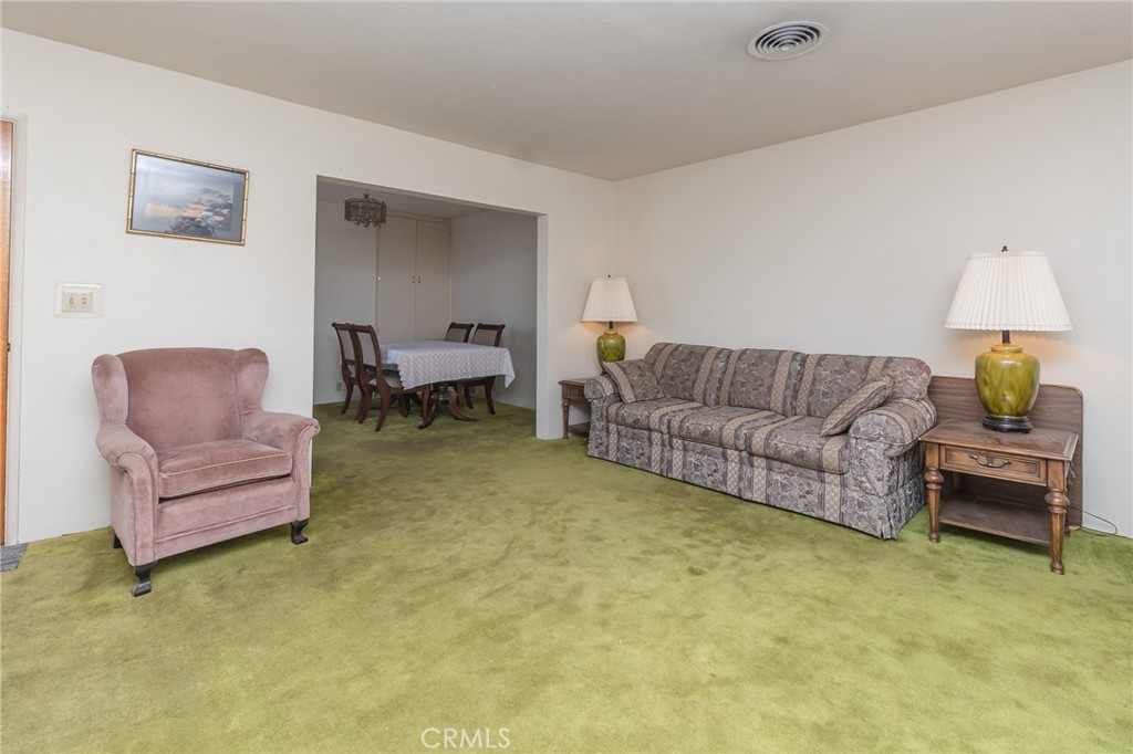 630 Acoma Street Needles, CA 92363 - Photo 9 of 60 a living room with furniture and a couch