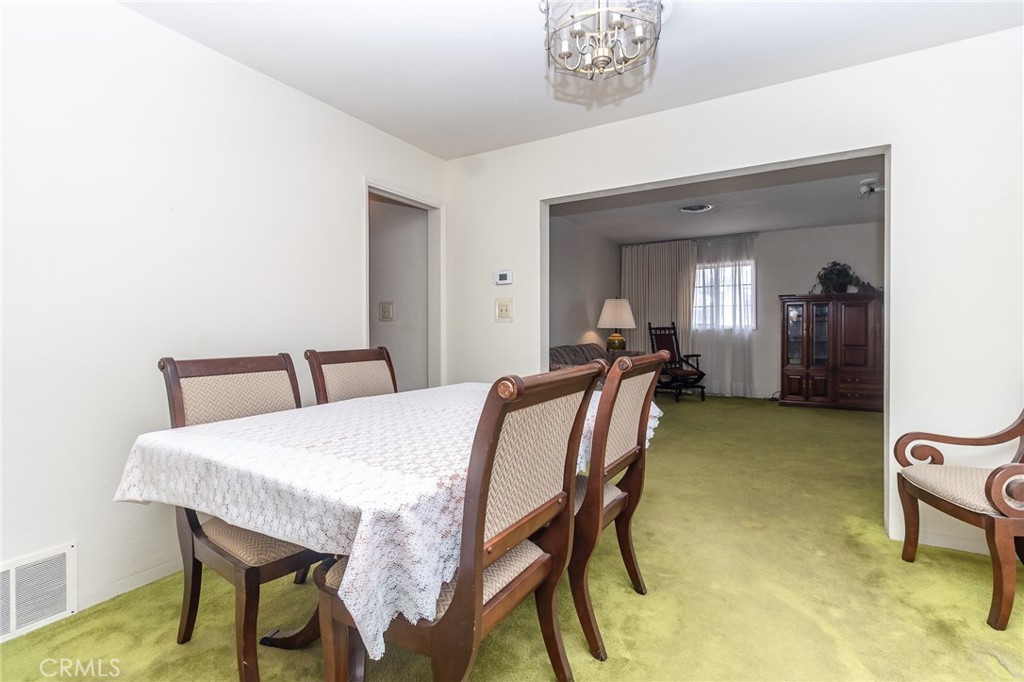 630 Acoma Street Needles, CA 92363 - Photo 10 of 60 a view of a dining room with furniture