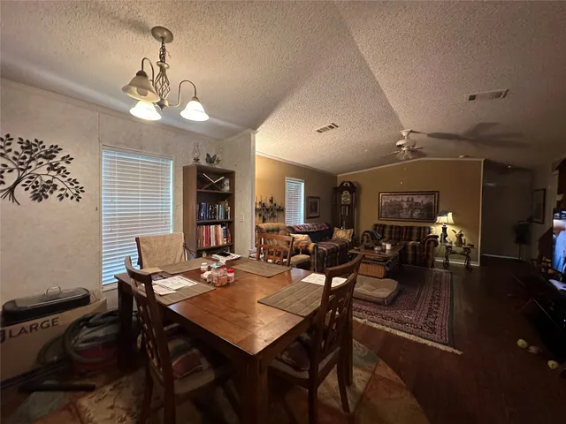a view of a dining room with furniture