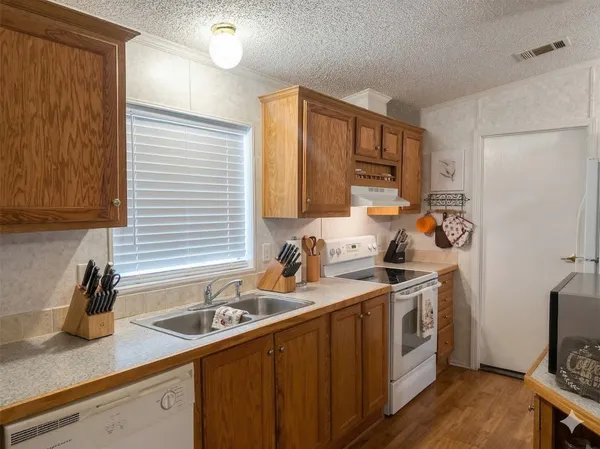 a bathroom with a toilet a sink and a mirror