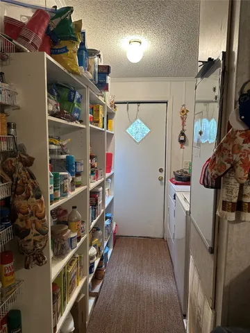 a view of storage and utility room
