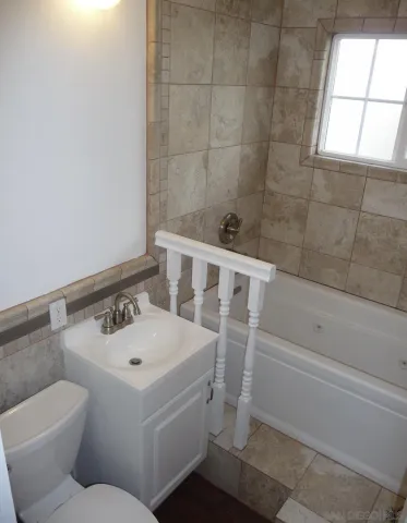 a bathroom with a sink and a toilet