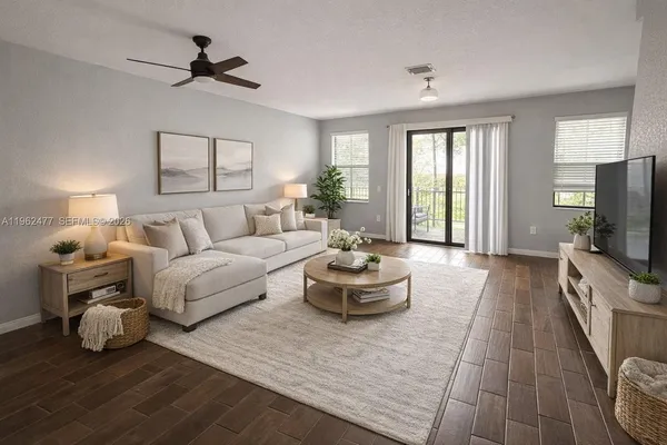 a kitchen with stainless steel appliances granite countertop a refrigerator stove microwave and sink