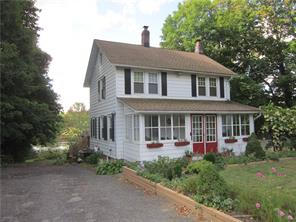 23 Old Firehouse Road Wallkill, NY 12589 - Photo 1 of 1 a view of a house with a yard and potted plants