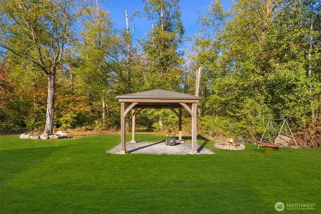 a view of a garden with a bench