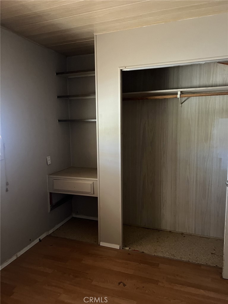 31596 Allen Avenue Homeland, CA 92548 - Photo 11 of 22 a view of room with wooden floor