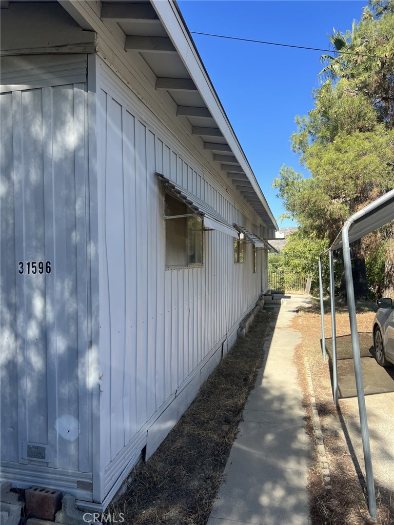 31596 Allen Avenue Homeland, CA 92548 - Photo 2 of 22 a view of a house with a backyard
