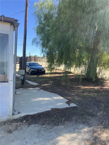 a view of street with parked cars