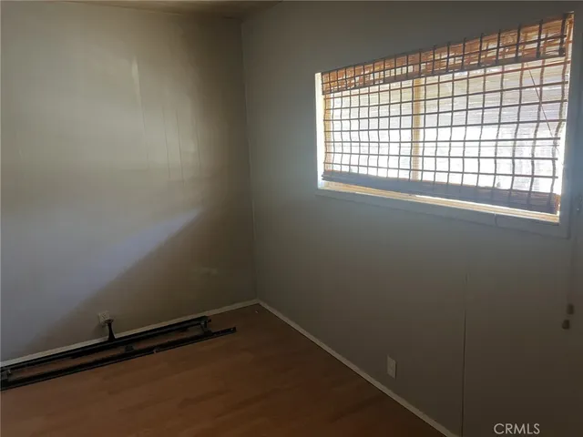 a view of a room with a window