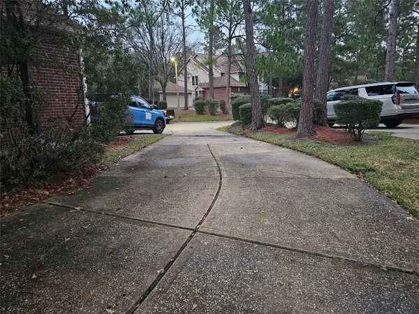 a view of street with parked cars