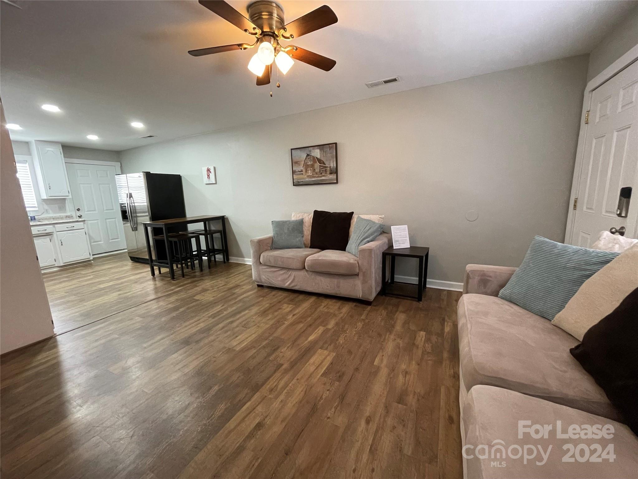 1544 Beth Haven Church Road Denver, NC 28037 - Photo 5 of 13 a living room with furniture and a flat screen tv