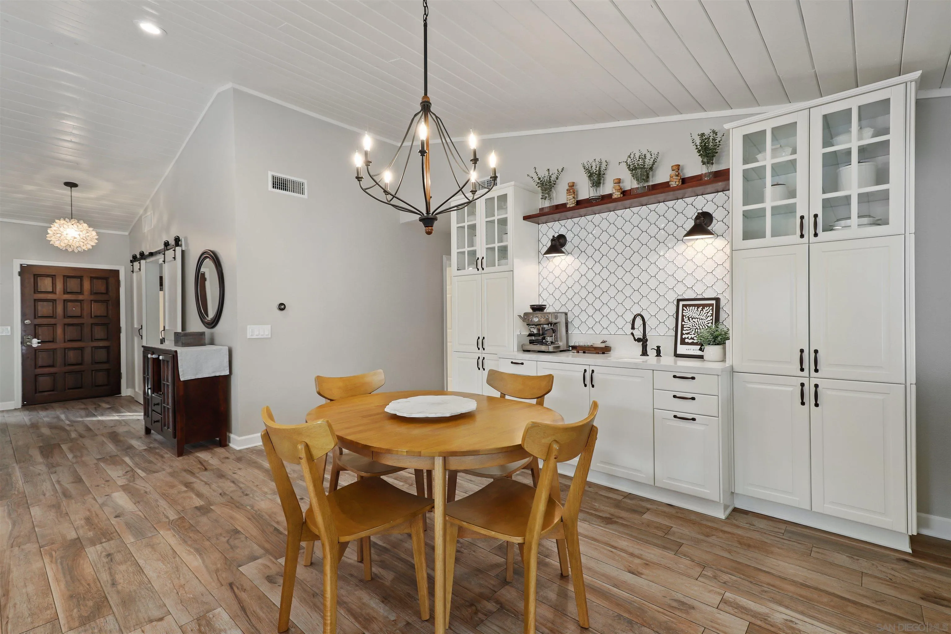 14717 Fieldview Way Poway, CA 92064 - Photo 17 of 35 a view of a dining room with furniture and wooden floor