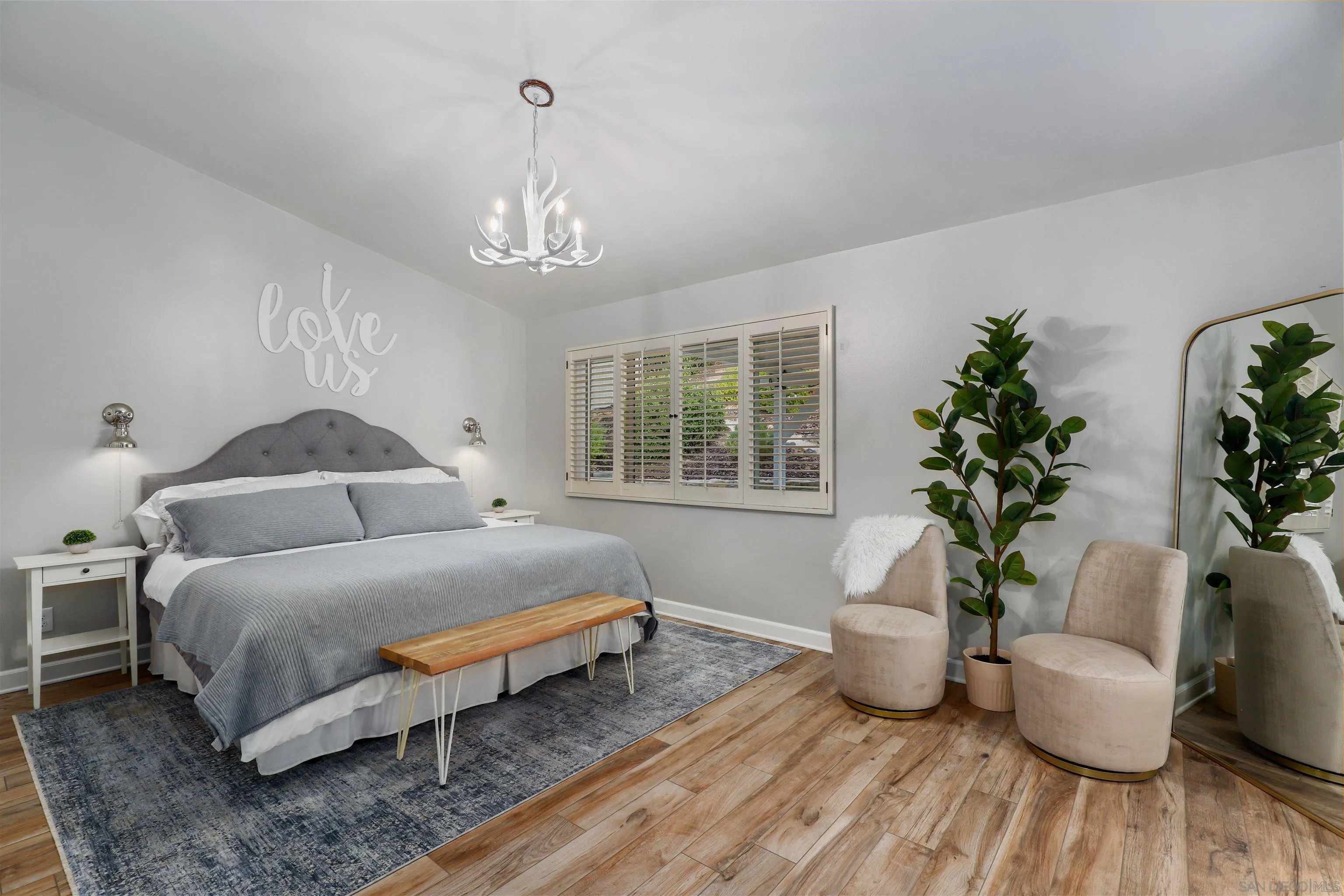 14717 Fieldview Way Poway, CA 92064 - Photo 20 of 35 a spacious bedroom with a bed and a potted plant