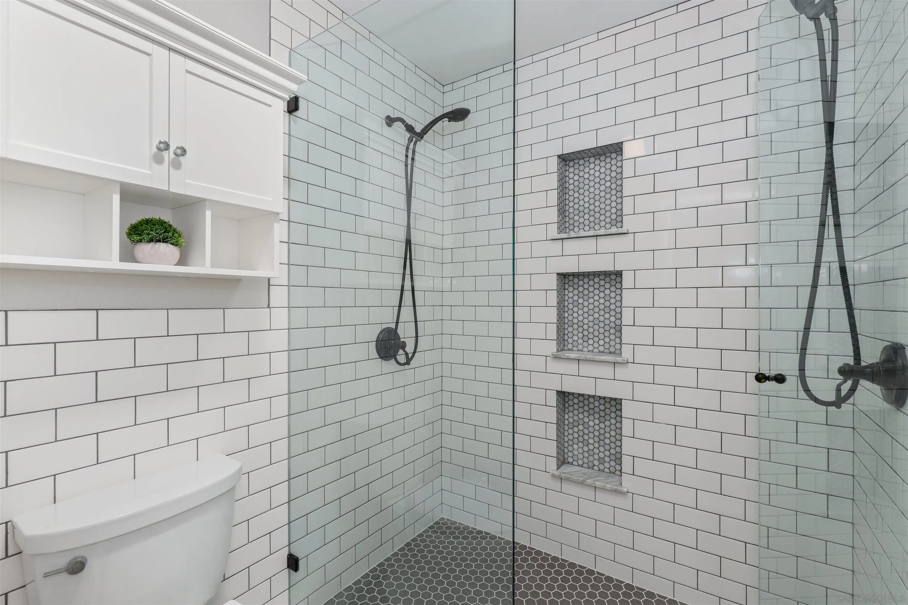 14717 Fieldview Way Poway, CA 92064 - Photo 24 of 35 a bathroom with a toilet and a shower