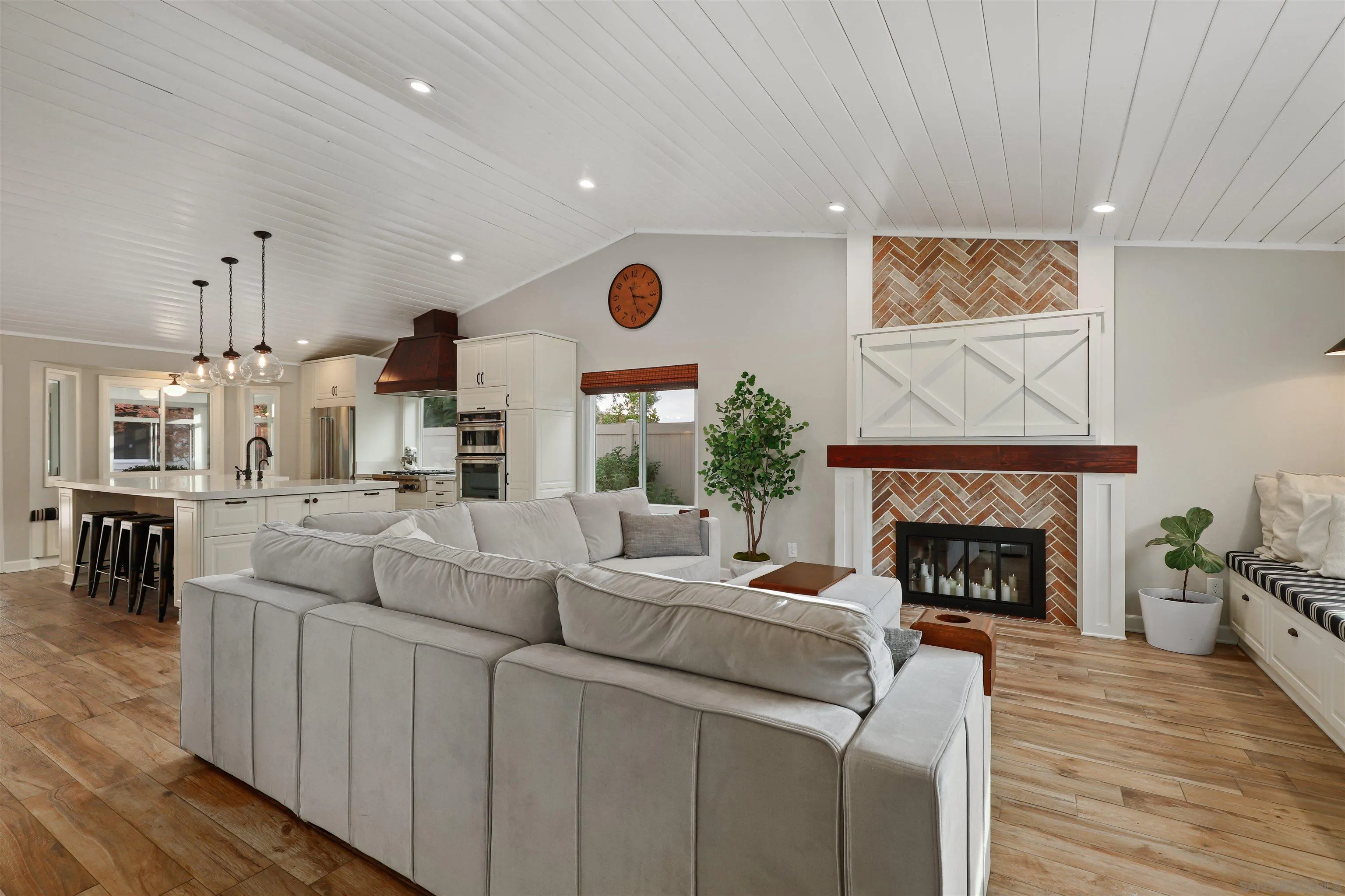 14717 Fieldview Way Poway, CA 92064 - Photo 9 of 35 a living room with furniture a fireplace and a table