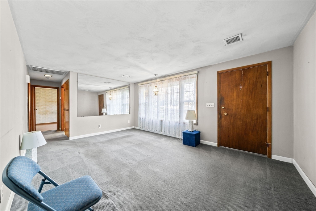 36 Dix Road Brockton, MA 02302 - Photo 12 of 31 a view of an empty room and glass door