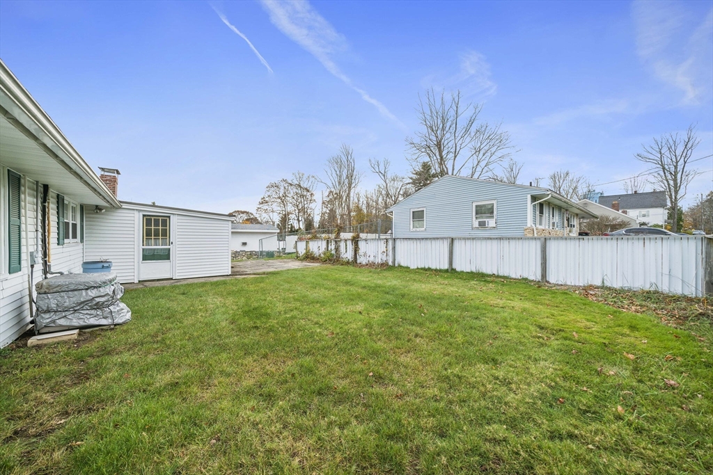 36 Dix Road Brockton, MA 02302 - Photo 3 of 31 a view of backyard with house and garden