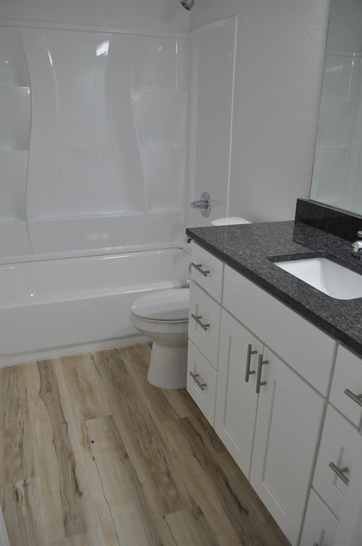 2360 Murphy Court Waxahachie, TX 75165 - Photo 15 of 22 a bathroom with a sink a toilet and shower