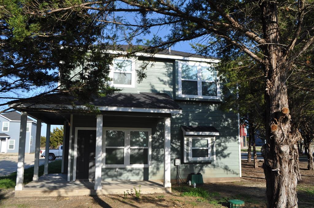 2360 Murphy Court Waxahachie, TX 75165 - Photo 3 of 22 a view of a store with the trees