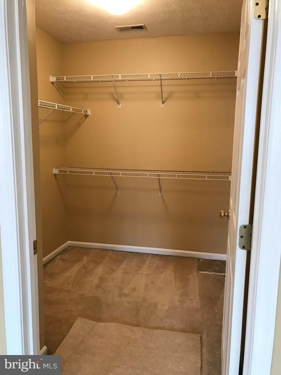 4149 Maple Path Circle, Unit 77 Nottingham, MD 21236 - Photo 15 of 17 Master Bedroom Walk-In Closet