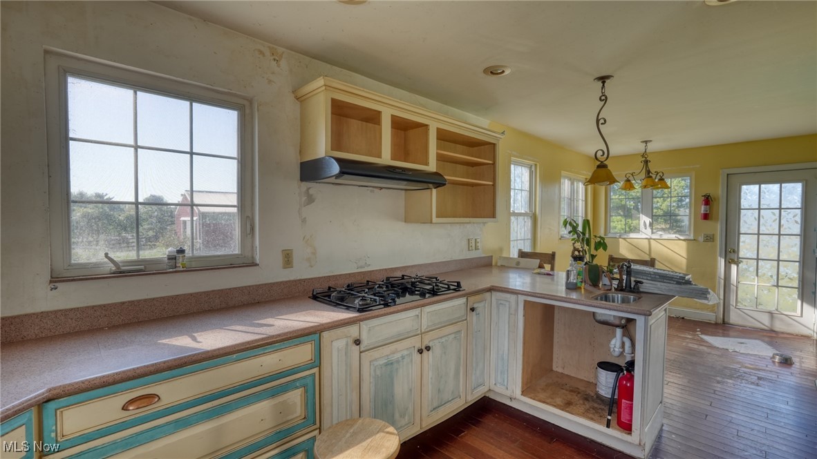 4896 High Hill Road Cambridge, OH 43725 - Photo 11 of 48 Kitchen featuring a peninsula, and dining area
