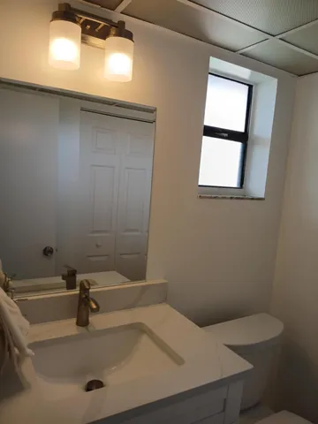 a bathroom with a sink and a vanity