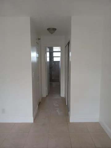 a view of a room with an entryway