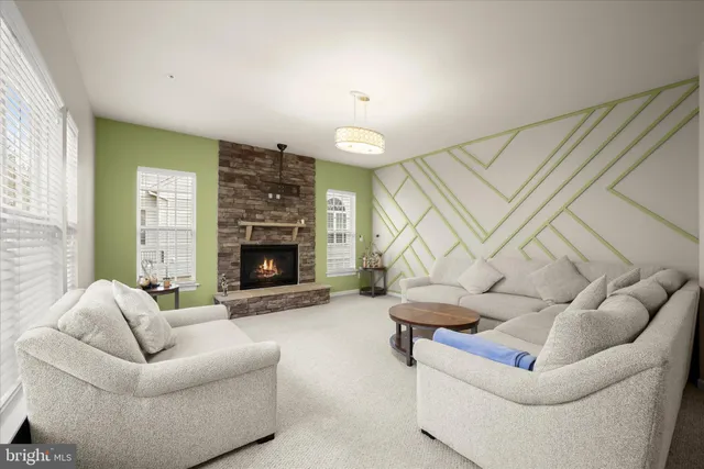 a view of a room with wooden floor and a window