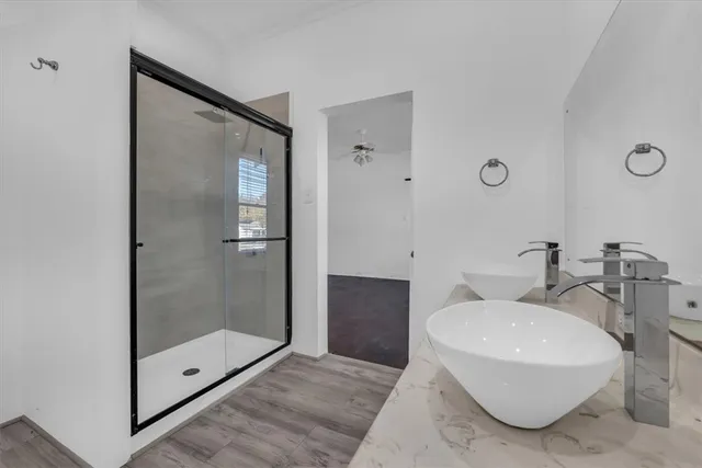 a bathroom with a sink and mirror