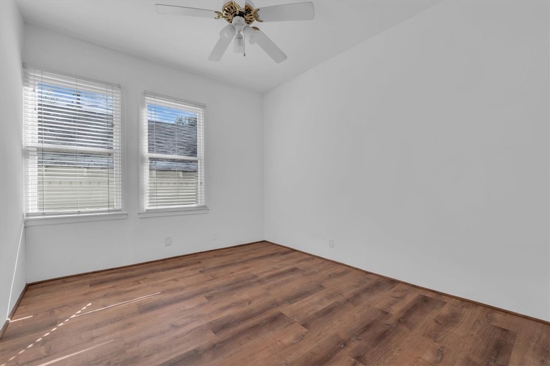 2700 Pine Avenue Waco, TX 76708 - Photo 18 of 29 a view of empty room with wooden floor and fan