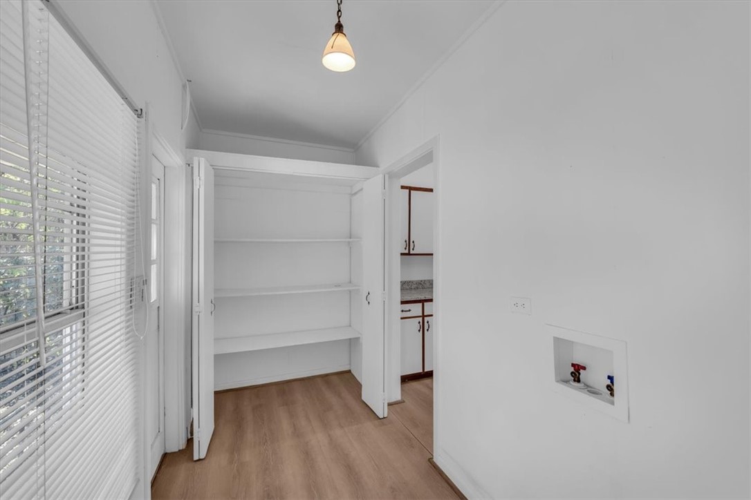 2700 Pine Avenue Waco, TX 76708 - Photo 24 of 29 a view of walk in closet with empty racks