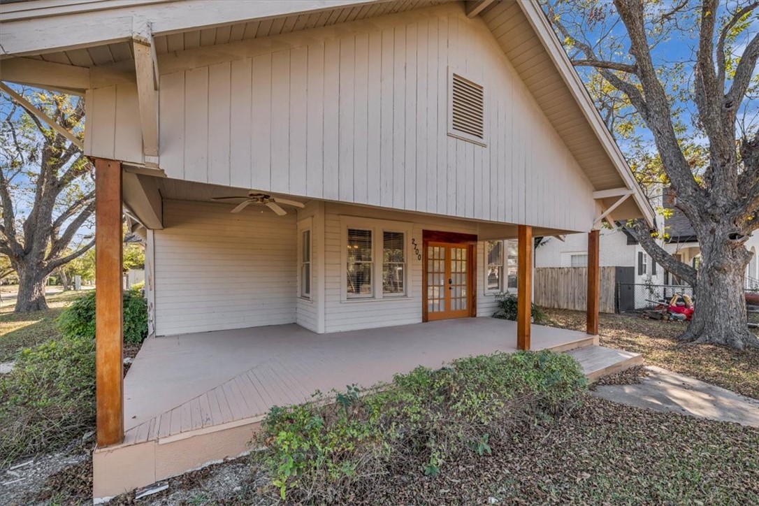 2700 Pine Avenue Waco, TX 76708 - Photo 27 of 29 a front view of a house with a garden and trees