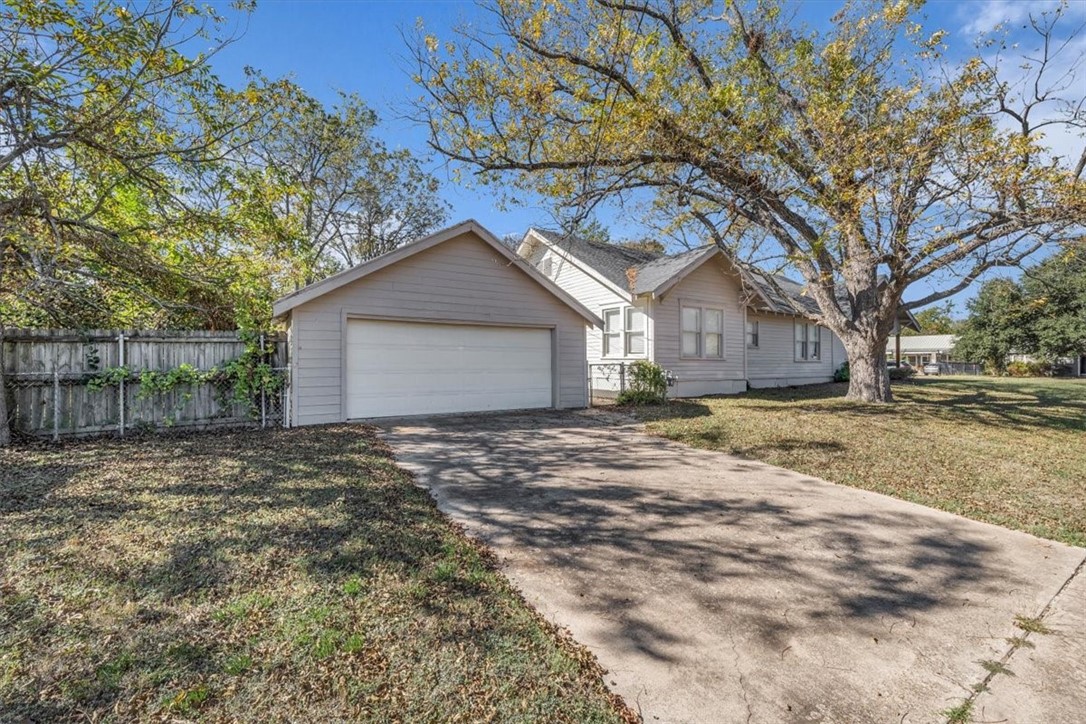 2700 Pine Avenue Waco, TX 76708 - Photo 28 of 29 a house with a tree in front of it