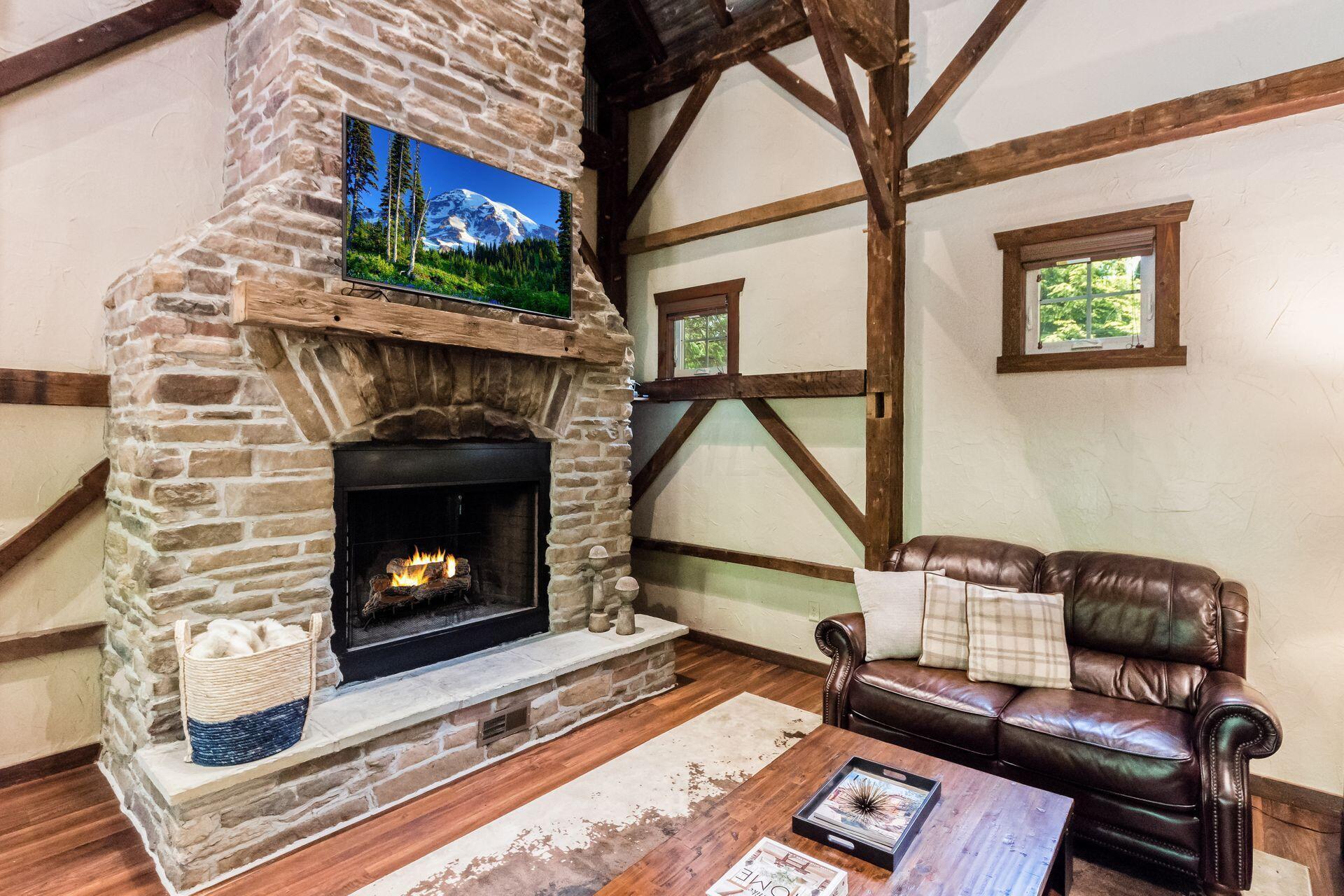 11444 Hazel Dell Road Howard, OH 43028 - Photo 12 of 41 The stone fireplace is the focal point of the room.
