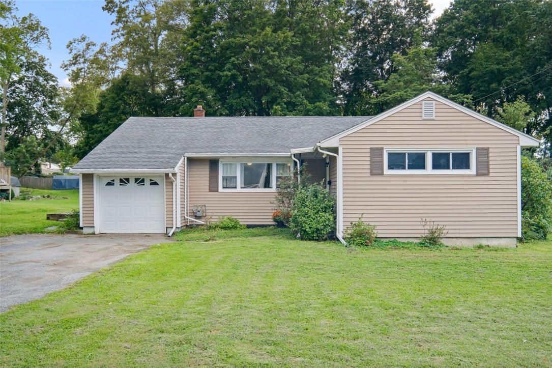 4 Miller Road Poughkeepsie, NY 12603 - Photo 1 of 1 Single story home featuring a garage and a front lawn
