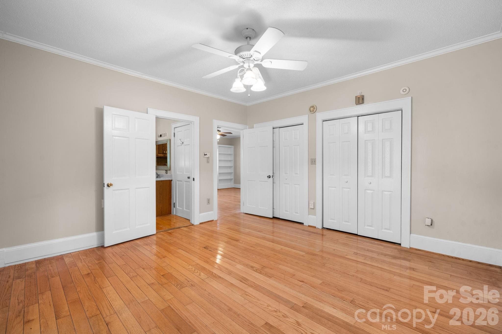 144 Hunter Bridge Road Stony Point, NC 28678 - Photo 18 of 45 a view of an empty room with wooden floor