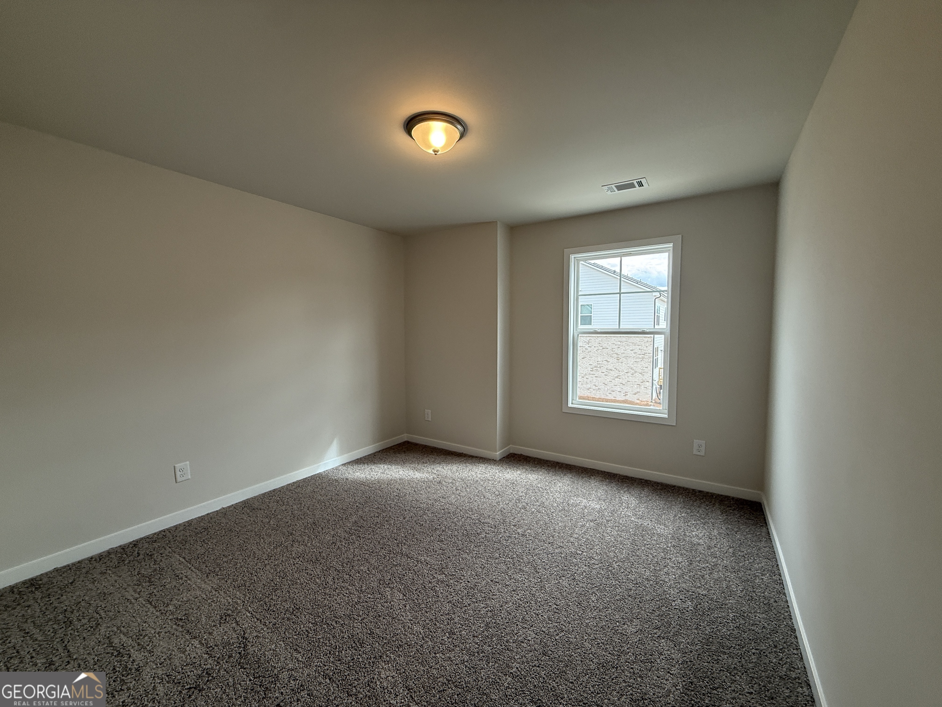 177 Depot Landing Road, Unit 26A Auburn, GA 30011 - Photo 15 of 41 an empty room with windows