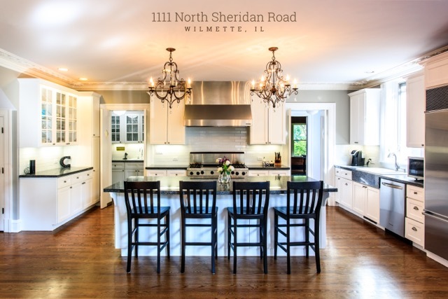 1111 Sheridan Road Wilmette, IL 60091 - Photo 18 of 76 a dining room with wooden floor a chandelier a wooden table and chairs